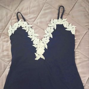 Size large beautifully detailed fitted/bodycon dress. NWT